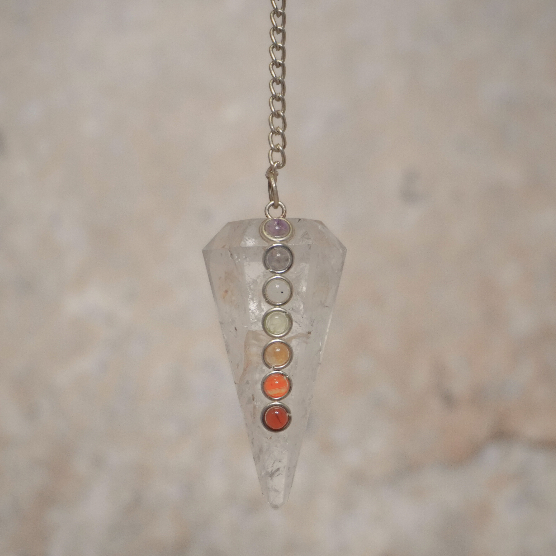 Clear Quartz Pendulum for energy amplification, intuitive guidance, and crystal healing.