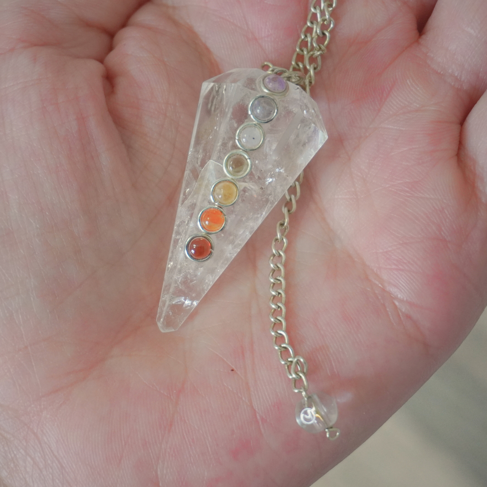 Clear Quartz Pendulum with natural transparency for meditation and focus.