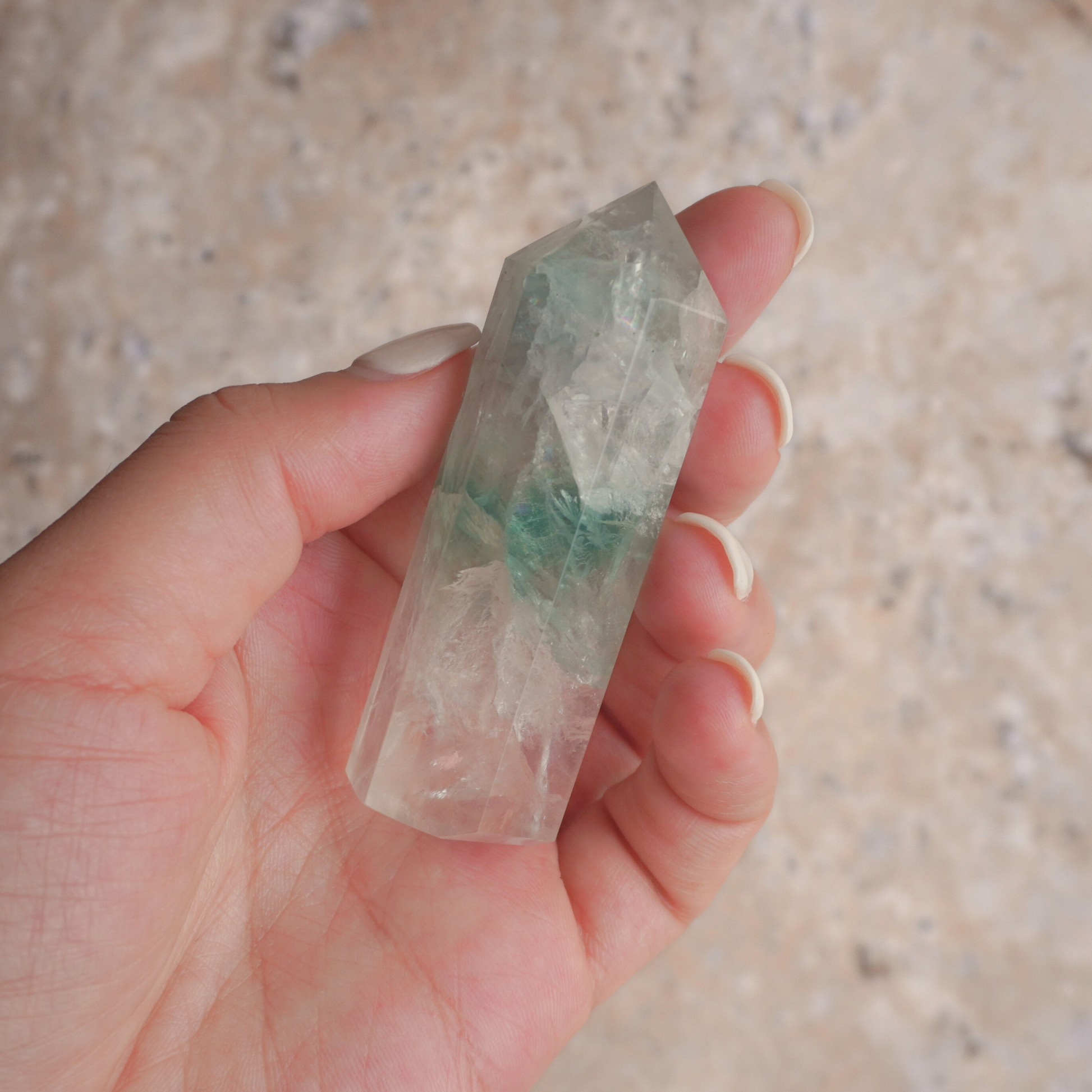 Green Fluorite crystal tower for clearing negative energy, improving concentration, and enhancing productivity.