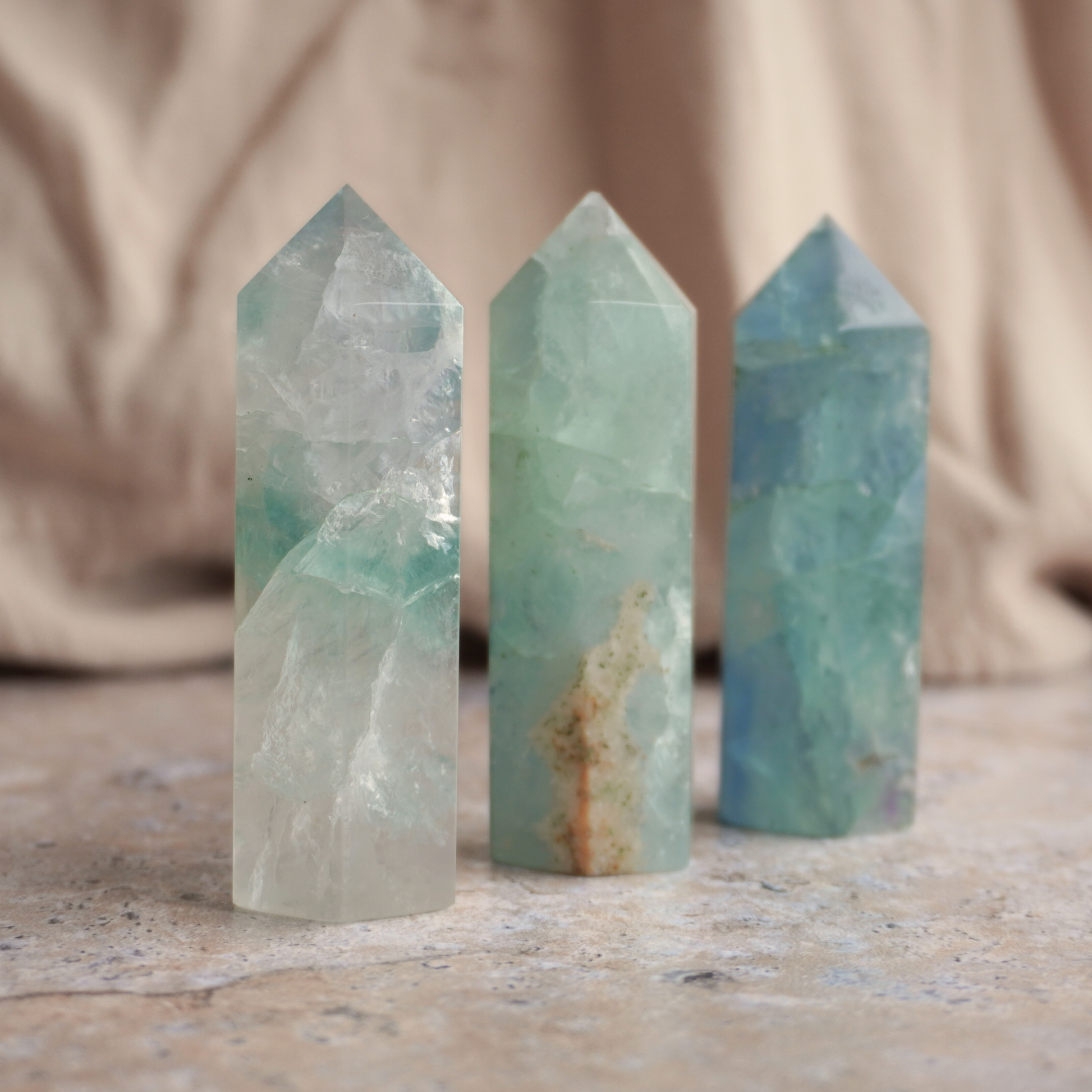 Fluorite crystal tower for brain fog relief, logical thinking, and energy cleansing. Ideal for work and study.