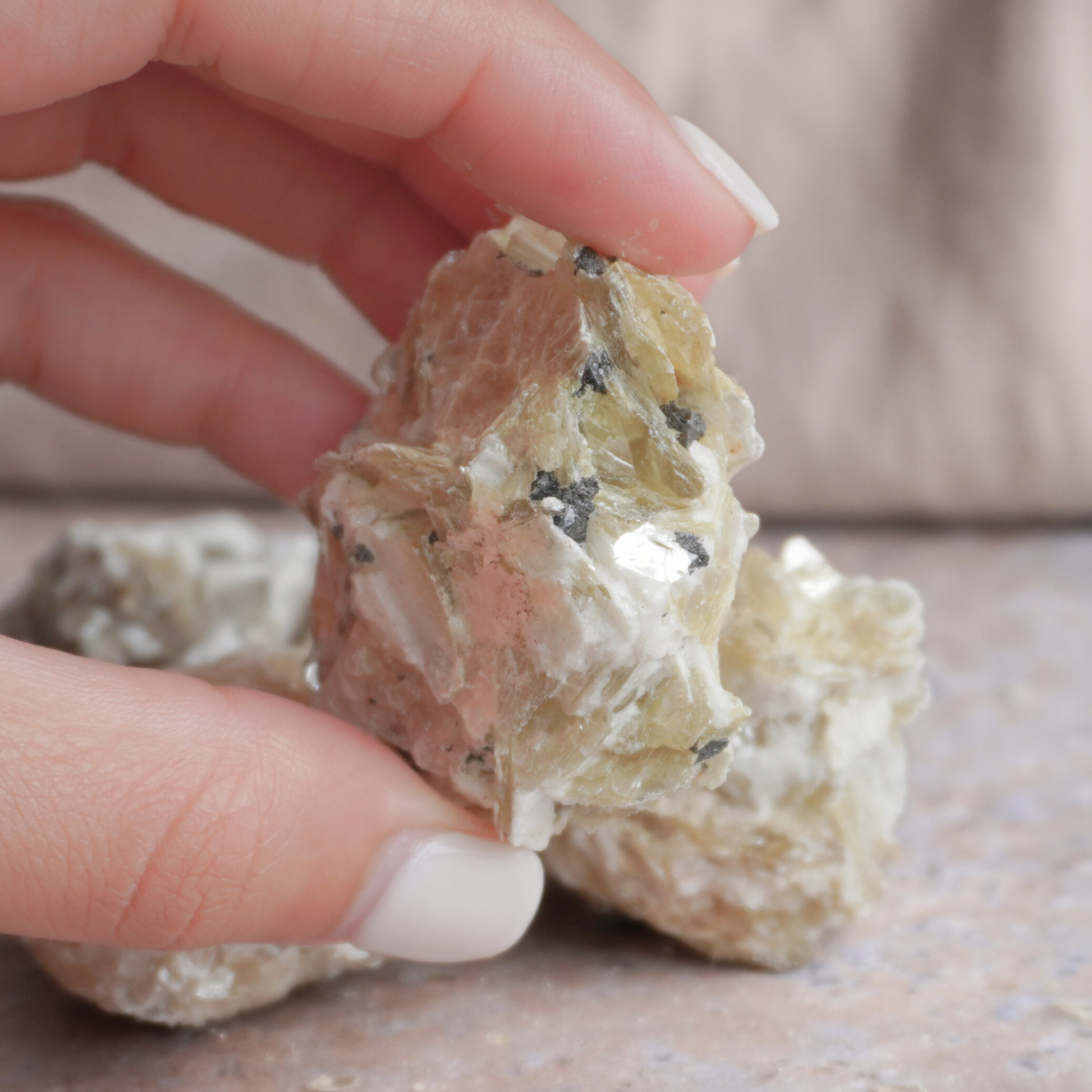 Natural Golden Mica healing crystal to boost self-esteem, enhance determination, and promote resilience.