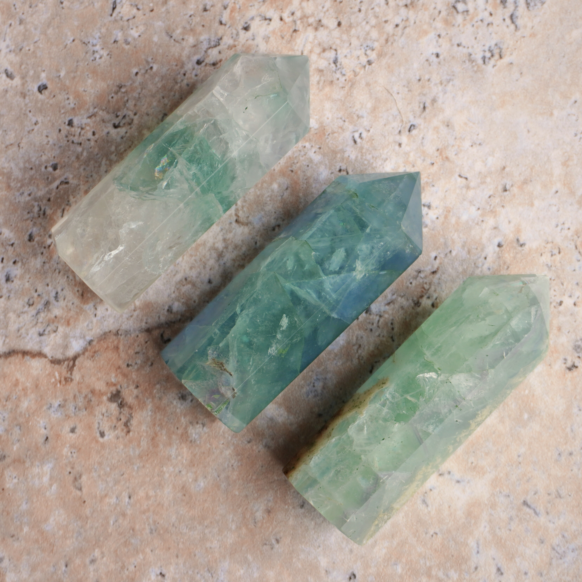 Fluorite tower energy stone for grounding, emotional healing, and spiritual connection.
