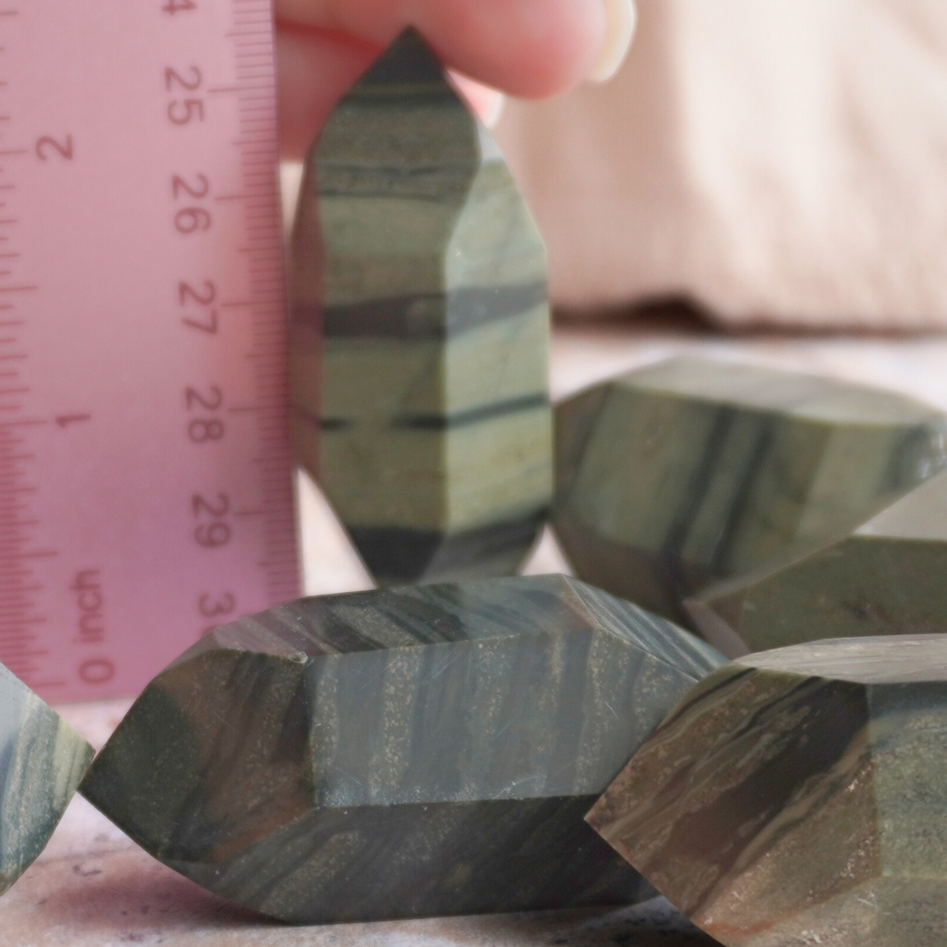 A Green Zebra Jasper healing stone, perfect for maintaining emotional stability, resilience, and focus.