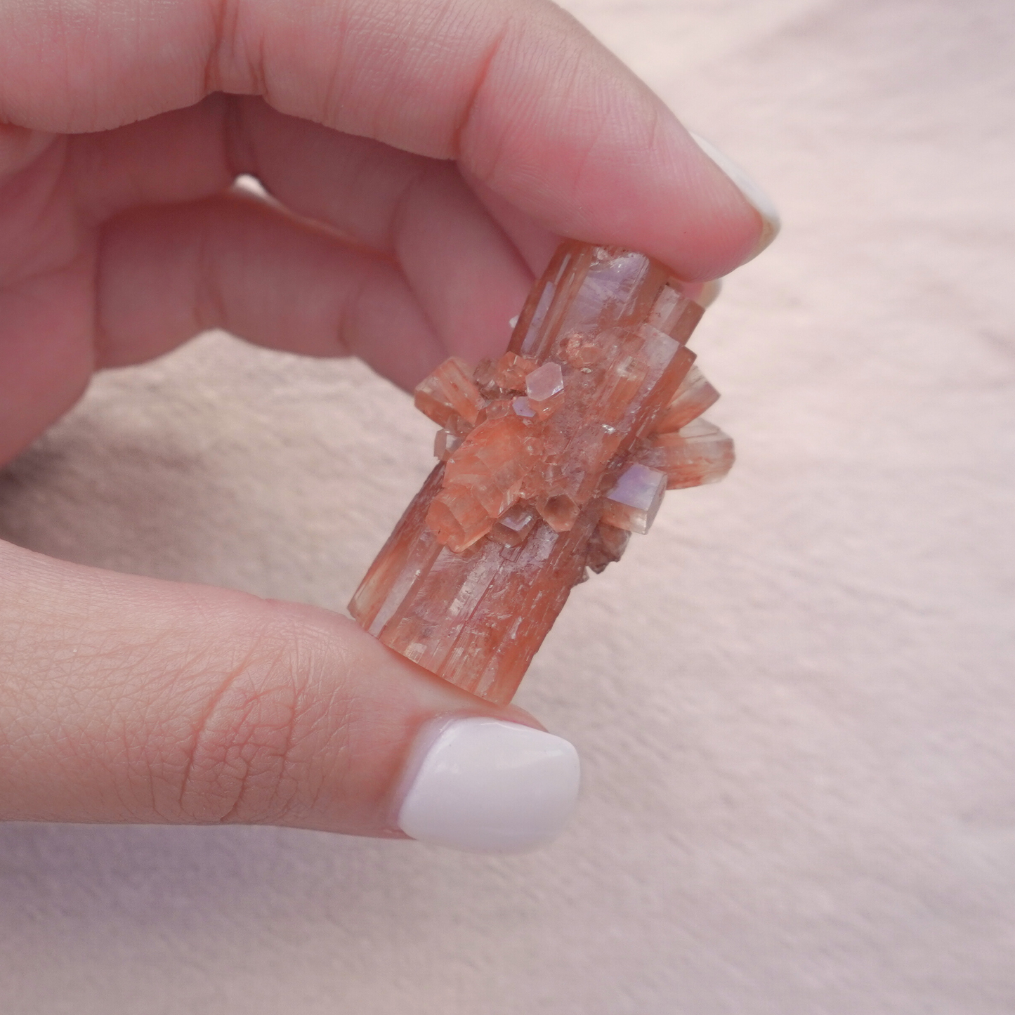 Raw Aragonite Crystal with deep orange tones and a natural geometric structure, perfect for crystal healing rituals.