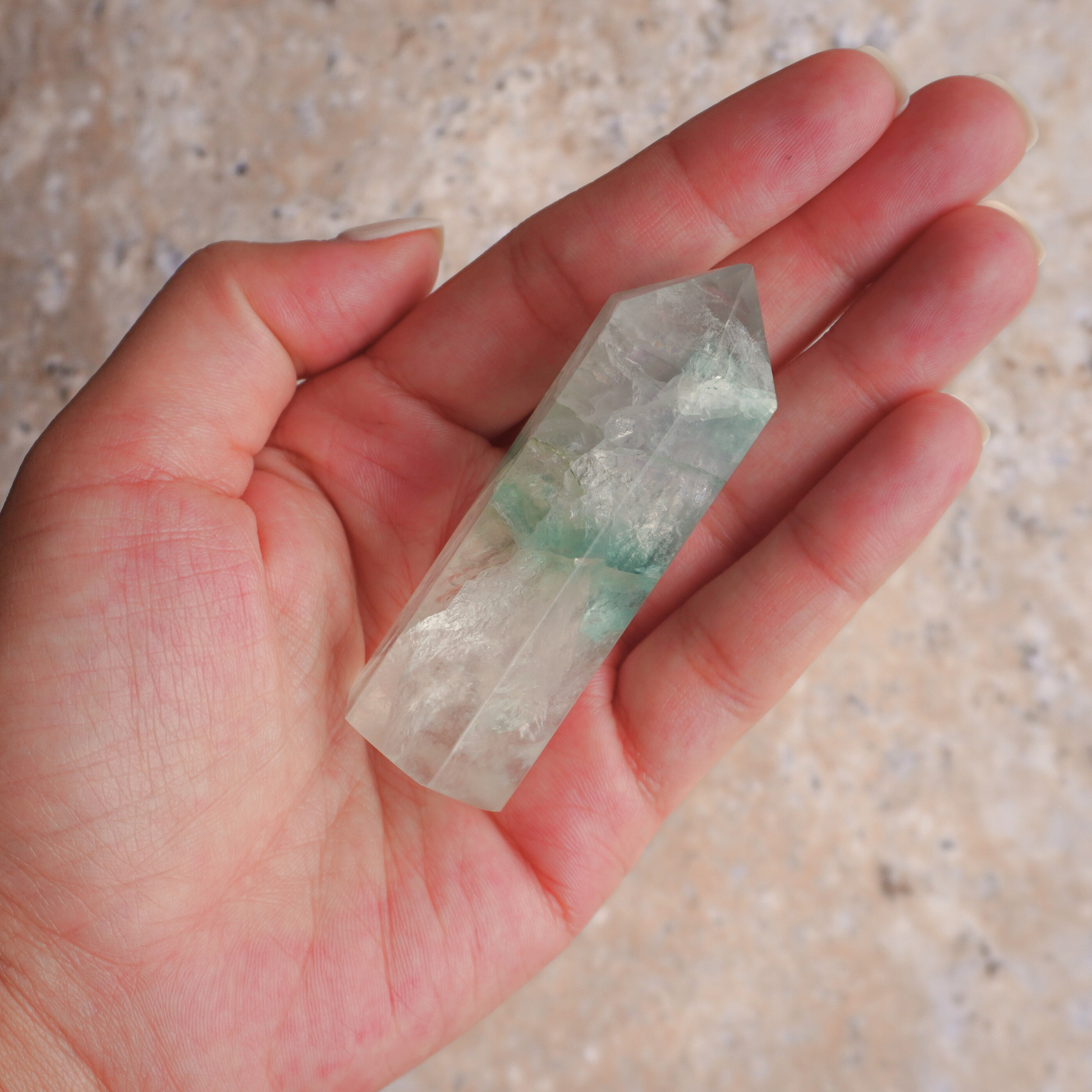 Green Fluorite crystal point for improved concentration, energy flow, and stress reduction.