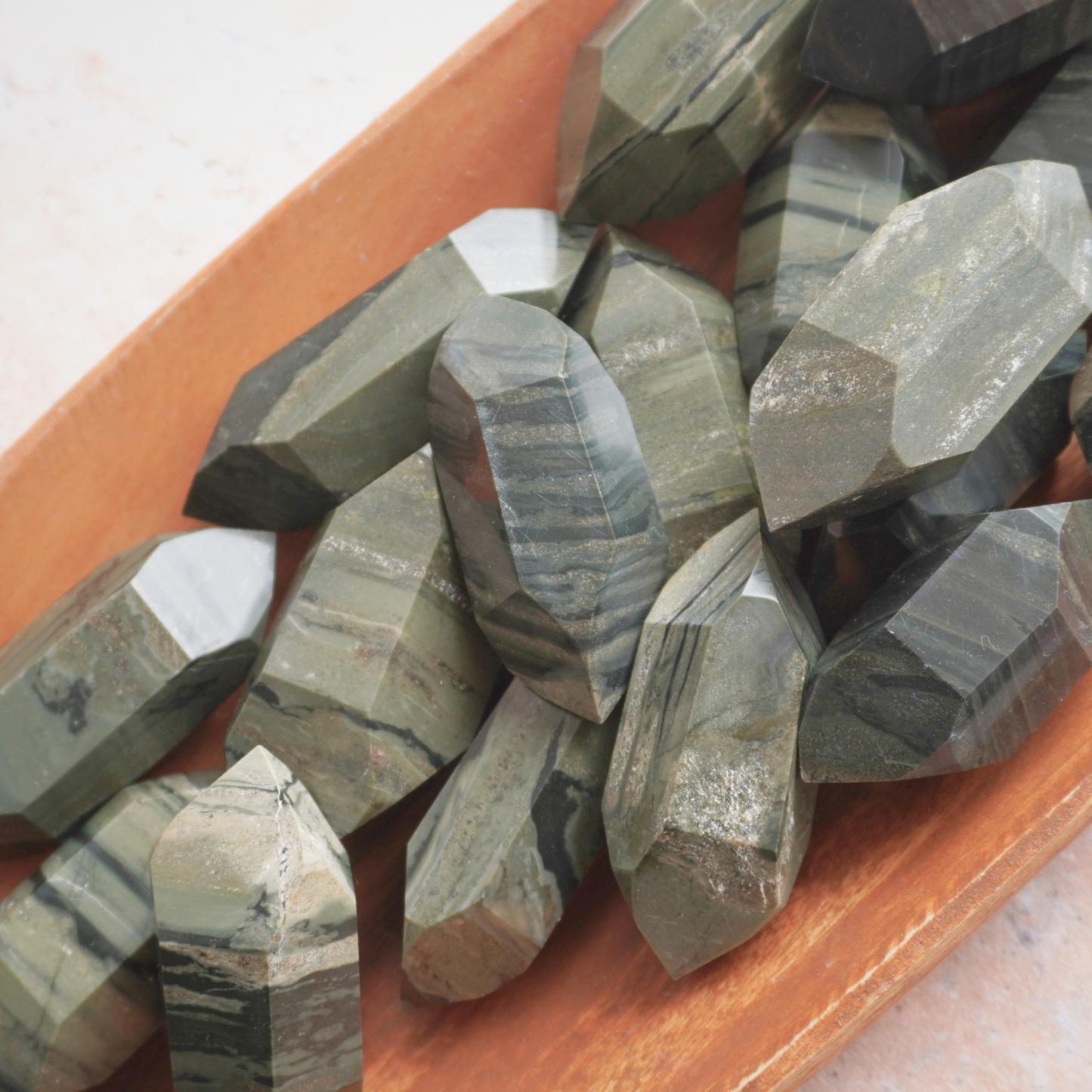 Grounding and protective Green Zebra Jasper energy stone, known for balancing emotions and reducing anxiety.