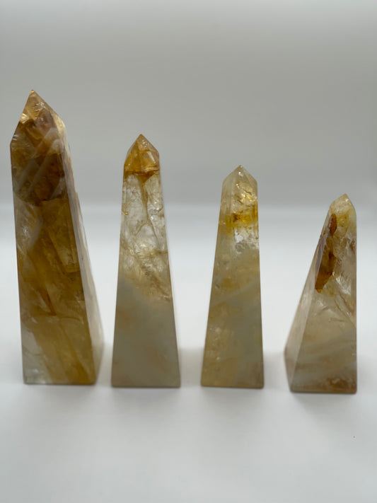 Hematoid Quartz Obelisk: Grounding and Transformation